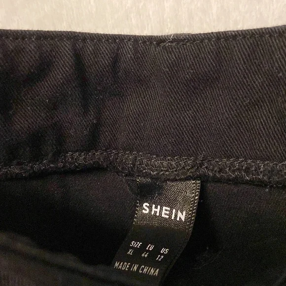 Black with black/white patched color block jeans. - Picture 4 of 5